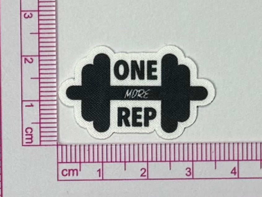 One More Rep Patch – Dumbbell Gym - with ruler for scale