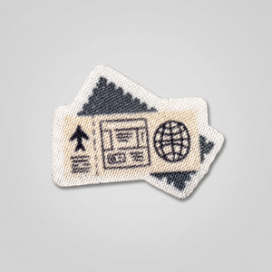 Tan fabric patch with travel document and passport icons