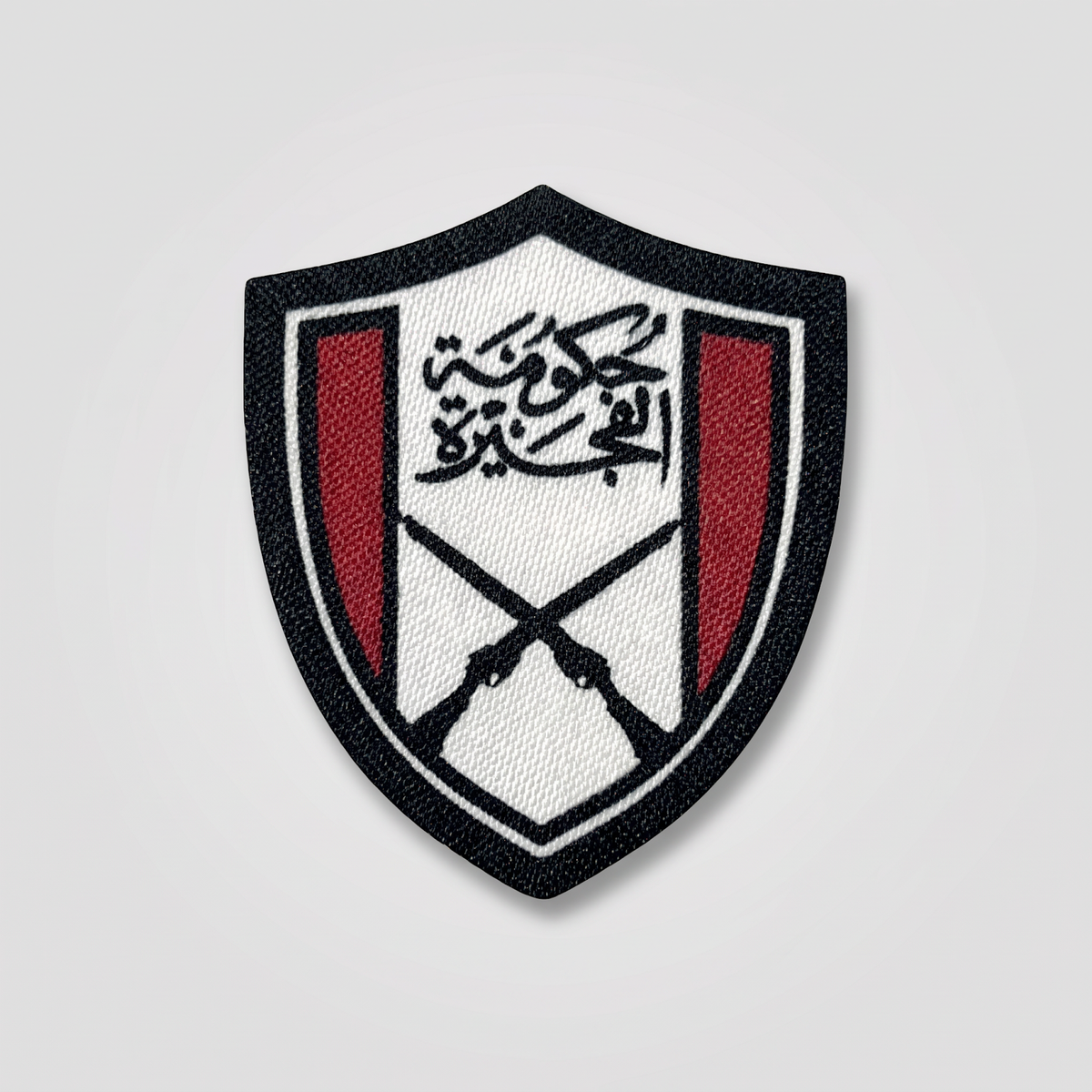 Red white and black shield emblem fabric patch with crossed rifles