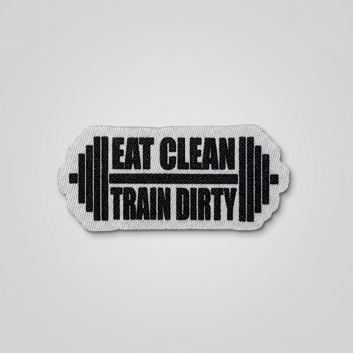 Eat Clean Train Dirty fabric patch with dumbbell graphics