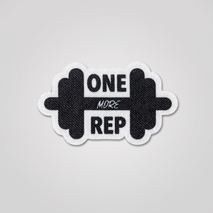 One More Rep fabric patch with dumbbell icon